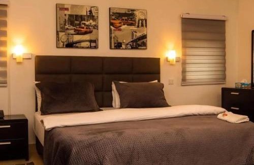 Kumasi Hotel | Momo's Guest House
