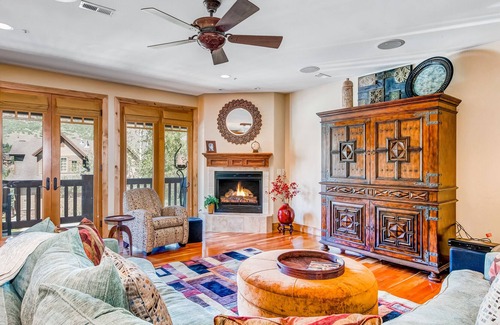 Canyon Links House | Mountain-view townhouse with hot tub, balcony, fireplace, grill, & media room