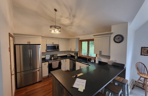Lincoln House | Multi-level, open concept, AC, wooded view, deck, swim club. F1602 by LRS