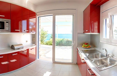 Pirgi Villa | My Rental Homes - Red Villa with infinity swimming pool with jacuzzi and sea view