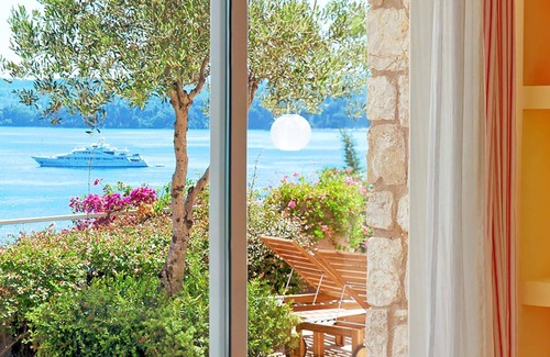 Pirgi Villa | My Rental Homes - Red Villa with infinity swimming pool with jacuzzi and sea view