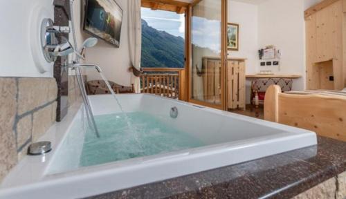San Giovanni di Fassa Hotel | MyTime Hotels la Grotta