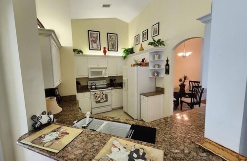 Imperial Golf Estates Condo | Naples Imperial Golf Condo Overlooking Gomez Tennis Academy