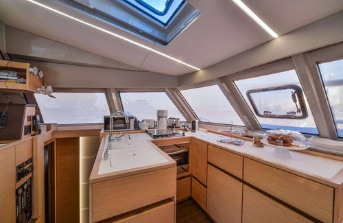 Tourlos Boat Rental | Nautitech 46 Catamaran in Mykonos by Fnatsia Villas