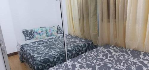Sasa Apartment | Near SM Lanang & Samal Wharf - 2BR Condo Davao - Netflix
