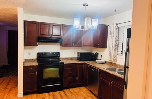 Northeast Edmonton House | Neon Lights Staycation. 4 BDR, Jacuzzi, VIP Lounge, 2 Living Rooms.
