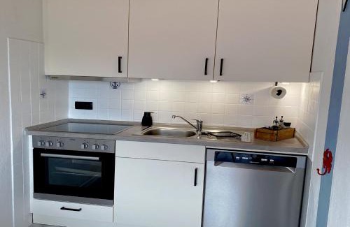Neßmersiel Apartment | Nessmersiel, Ferienwohnung mit Balkon in Deichnähe, Wallbox, renoviert
