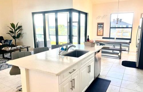 Burnt Store House | New 4 bed house on a canal facing south & door ramp, near golf course and softball