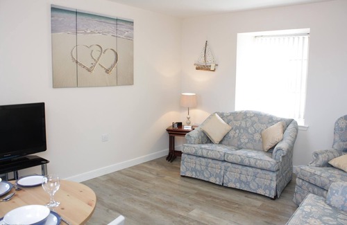 Banff Apartment | New apartment with views over the sea, beach and Banff harbour