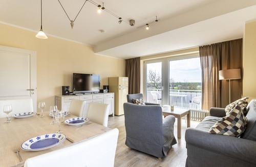 Busum Apartment | NEW: Holiday home with dike view 300m to the beach