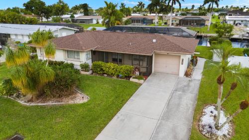 Caloosahatchee Villa | NEW LISTING! Electric-Heated Pool Home on Gulf Access with dock - Villa Paradise Cove