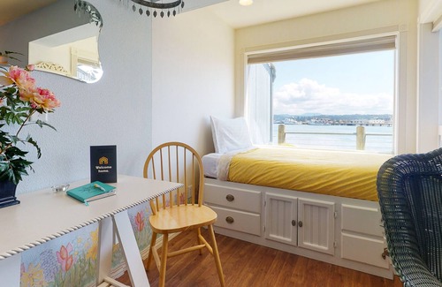 Historic Bayfront Apartment | New listing! Waterfront lodge studio w/ fireplace & balcony - on the Bayfront!