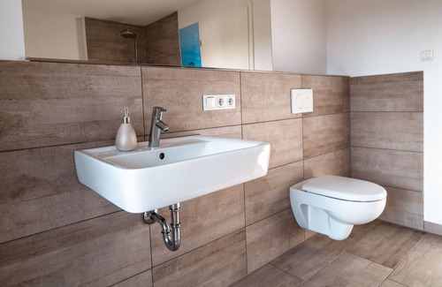 Stephanskirchen Apartment | NEW: VISITALPS roof terrace apartment Gutshof am Simssee