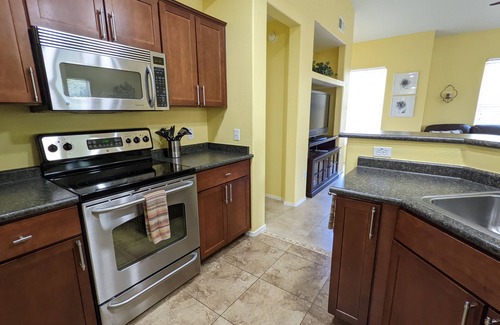 Surprise Condo | Nice 2 bed/2 bath/2 car garage condo in gated community close to many amenities!