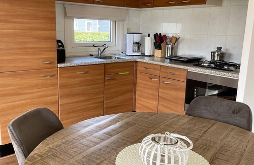 Lathum Ski Chalet | Nice Chalet With Dishwasher in a Holiday Park