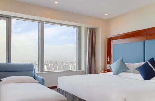 Pudong Hotel | Novotel Atlantis Shanghai - Enjoy our great-valued breakfast in our rooftop revolving restaurant with a stunning river view & utilize our FREE self-serviced laundry