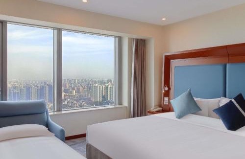 Pudong Hotel | Novotel Atlantis Shanghai - Enjoy our great-valued breakfast in our rooftop revolving restaurant with a stunning river view & utilize our FREE self-serviced laundry