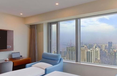 Pudong Hotel | Novotel Atlantis Shanghai - Enjoy our great-valued breakfast in our rooftop revolving restaurant with a stunning river view & utilize our FREE self-serviced laundry
