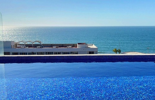 Mazatlan Condo | Ocean view 1 block from the malecon beach