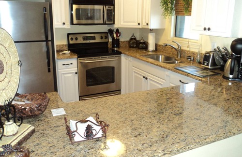Central Beach Condo | Oceanfront 2B Gem .March-!.Aug.custom kitchen West Indies,decor Heated.Pool.