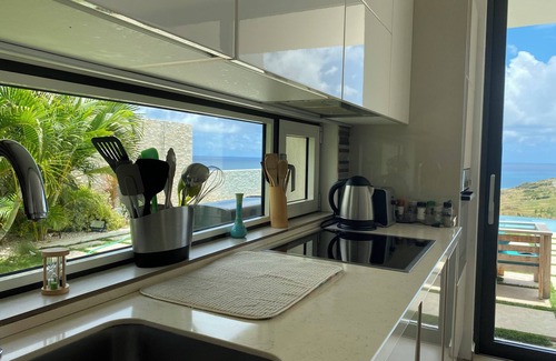 Indigo Bay Villa | Oceanfront Bliss: 3-Bedroom Escape with Breathtaking Views & Tropical Charm!