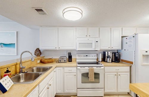 Point East Condo | Oceanfront , upscale, oceanfront condo with Olympic pool & beach access