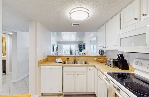 Point East Condo | Oceanfront , upscale, oceanfront condo with Olympic pool & beach access