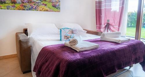Rivoltella Apartment | Oleandro Apartment - Featuring a Private Garden and Access to 5 Pools