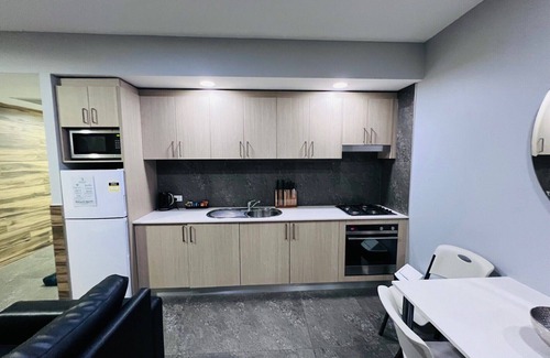 Hamilton Apartment | One Bedroom Deluxe Spa Apartment