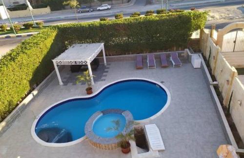 Hurghada Apartment | One bedroom flat with large terrace in a villa with swimming pool