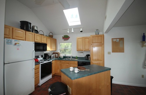 Cape May Point Condo | Only 2 short blocks to the beach! Fabulous 4 bedroom, 2.5 bath Cape May Point Cottage with living space on one level.