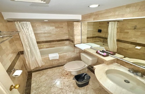 Brgy. 719 Hotel | Orchid Garden Suites