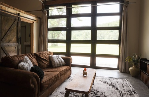 Cullowhee House | Oscar's Barn- Relax and unwind at our mountain barn on the river.