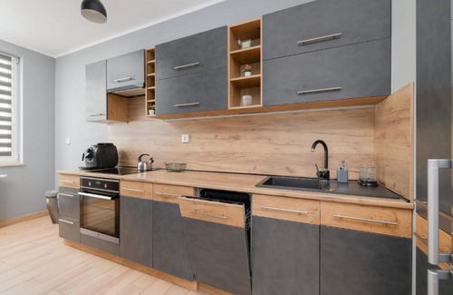 Czyzyny Apartment | Osiedle Avia Family Apartment in Kraków with Balcony by Noclegi Renters