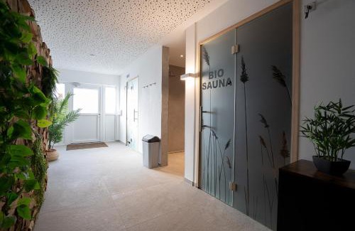 Gronenberg House | Ostseecamp Lübecker Bucht Ferienhaus "JU-LI" mit kostenlosen Saunazugang
