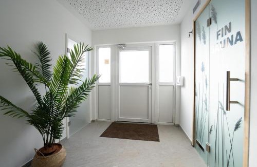Gronenberg House | Ostseecamp Lübecker Bucht Ferienhaus "JU-LI" mit kostenlosen Saunazugang