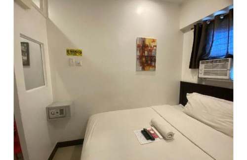 Guadalupe Nuevo Hotel | OYO 888 City Stay Inns Fortview BGC