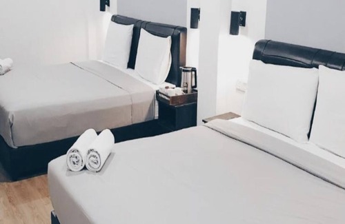 Pekan Melayu Hotel | OYO 89492 Carlton Inn Bukit Ubi