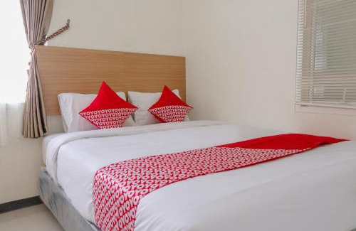 Jember Hotel | OYO Flagship 1603 Antosa Family Residence Silver Key