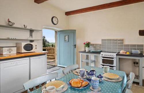 Llanybri House | Oysterlow - A beautiful country cottage with estuary views and enclosed garden