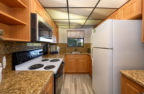 Marathon Villa | PA Beach, Pool, kitchen, Dock, Ocean View, BBQ, arrive any day, tropical, patios