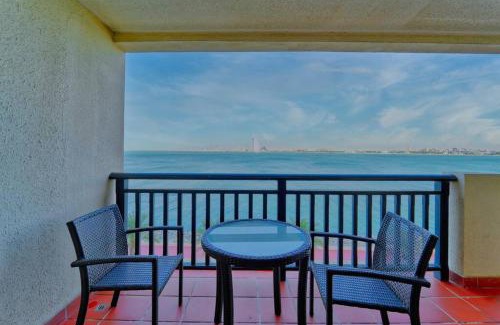 Palm Jumeirah Apartment | Palm Paradise 1BR - Beachfront Escape with Pool, Gym, Parking & Balcony