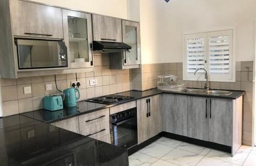 Gaborone Apartment | Palm29 at Sunset Mews, Grand Palm - self catering appartment - Your Ideal Getaway for Work or Relaxation