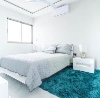 Centro Hotel | Palmarena Rooms & Residences - Long Stay Comfort with Parking, Sauna, Gym & Pool - Steps from 5th Avenue