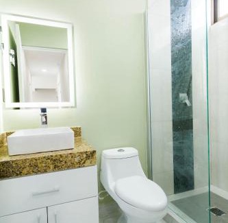 Centro Hotel | Palmarena Rooms & Residences - Long Stay Comfort with Parking, Sauna, Gym & Pool - Steps from 5th Avenue