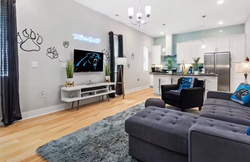 Third Ward House | PANTHERS THEMED 3-bedroom DUPLEX; 2 livings rooms & 2 kitchens, in uptown.