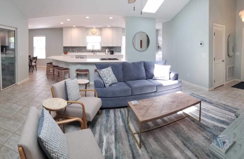 Butler Beach House | Paradise by the River - Relax in Style! New Pool and Heated Spa!