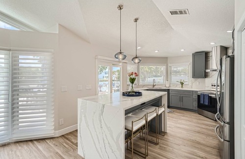 Harbor Hills House | Paradise Living on a Stunning Waterfront Home. Minutes from Belleair Beach.