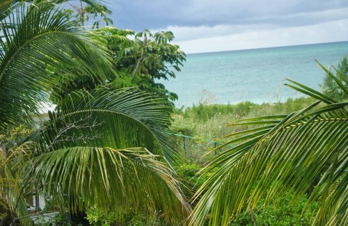 Freeport Apartment | Paradise on miles of white sandy beach and turquoise sea, private and secure.