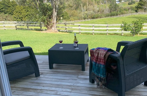 Mangawhai Cottage | Peaceful Cozy Cottage at Lazy Acres. 12 minutes to a wonderful surf beach.